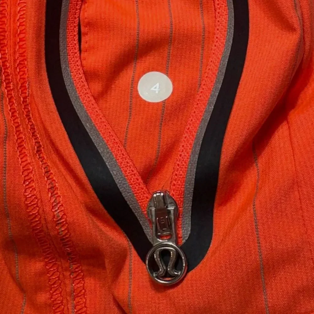 lululemon Get Up & Glow Jacket 4 Orange Navy Reflective Ponytail Hood